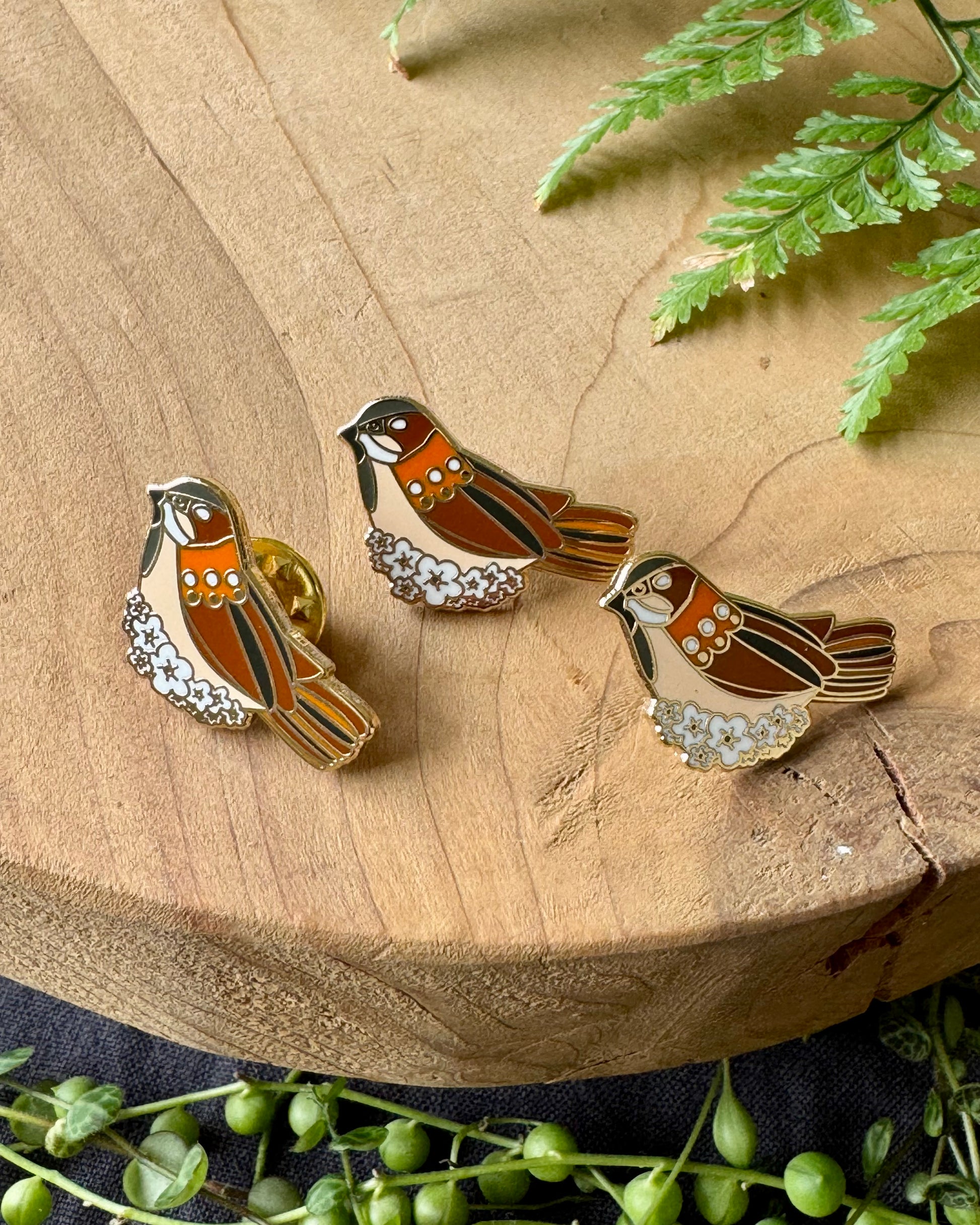 Hard enamel pin of a sparrow. based off of you are worth more than many sparrows bible scripture