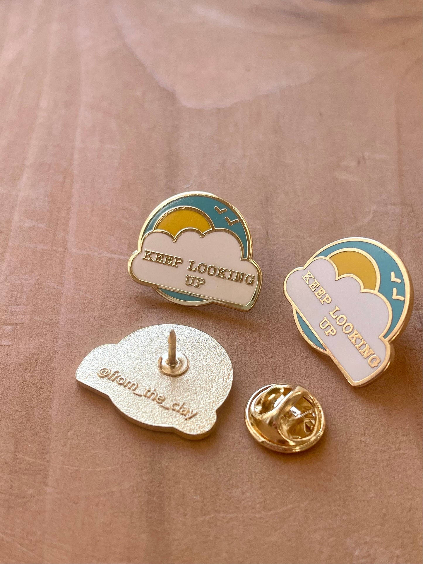 Keep looking up Pin or Magnet